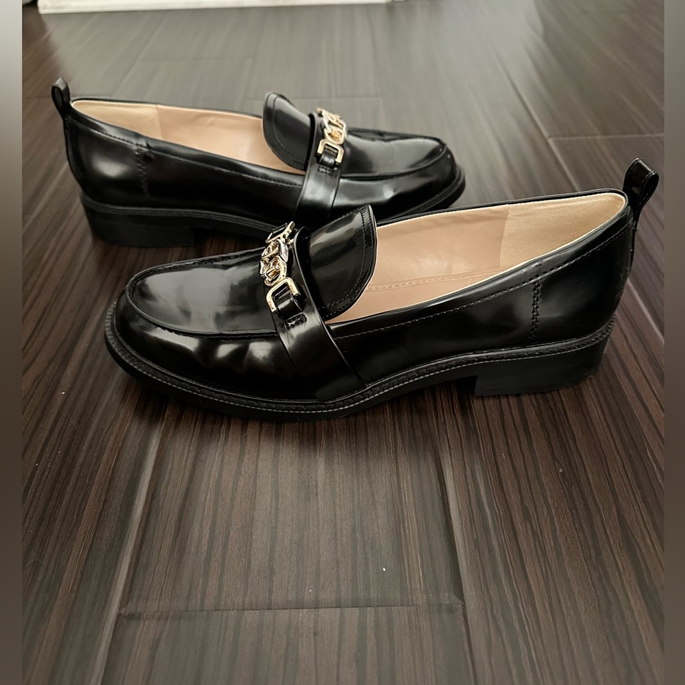 Sam Edelman Black and Gold Penny Loafers with Modern Chain Detail